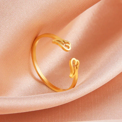 Bague aile d'ange dorée réglable pour femme